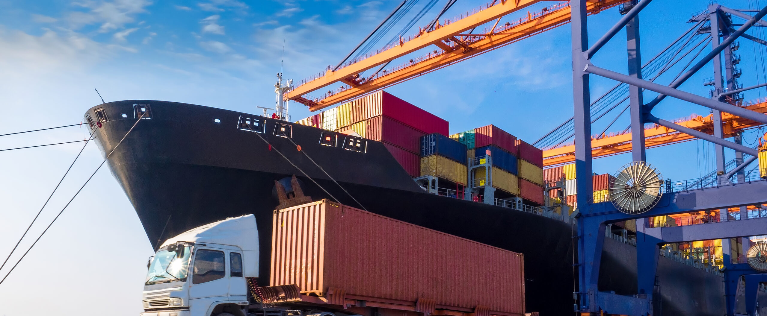 Container terminal with ships and trucks